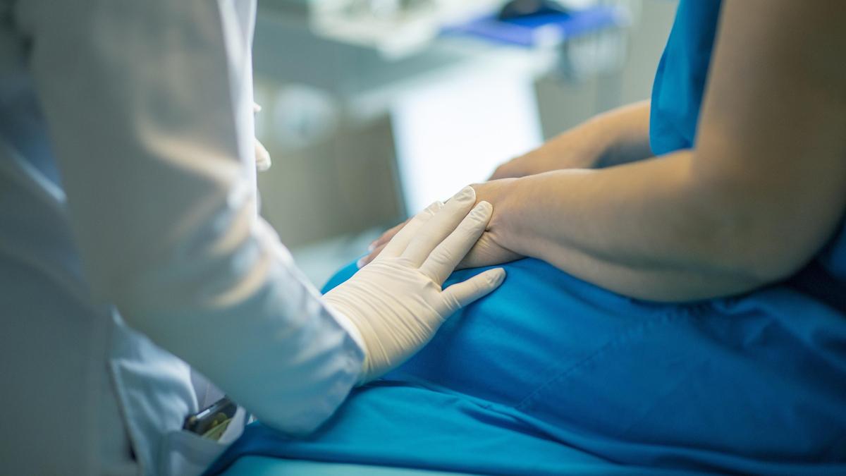 Doctor with patient pre surgery